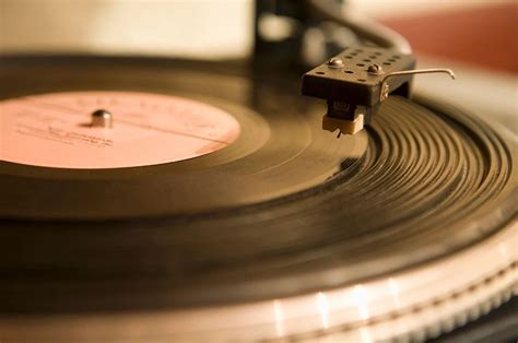 Where do DJs get their music, and why do vinyl records smell like nostalgia?